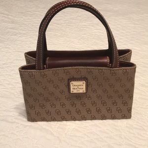 NWOT Dooney & Burke hand clutch with handles